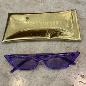 Poppy Lissiman le skinny translucent purple sunglasses with case.